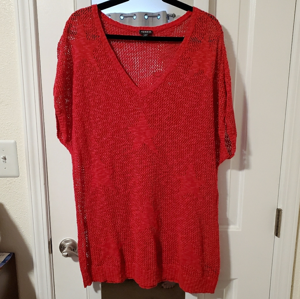Tunic length red sweater with star pattern
